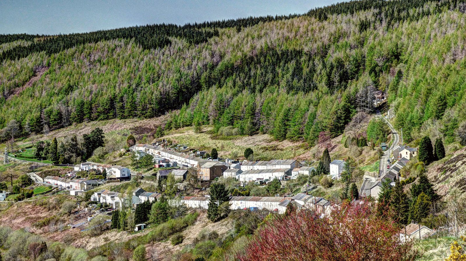 Blaenllechau village in the Rhondda Fach valley, South Wales — terraced houses nestled against the mountain