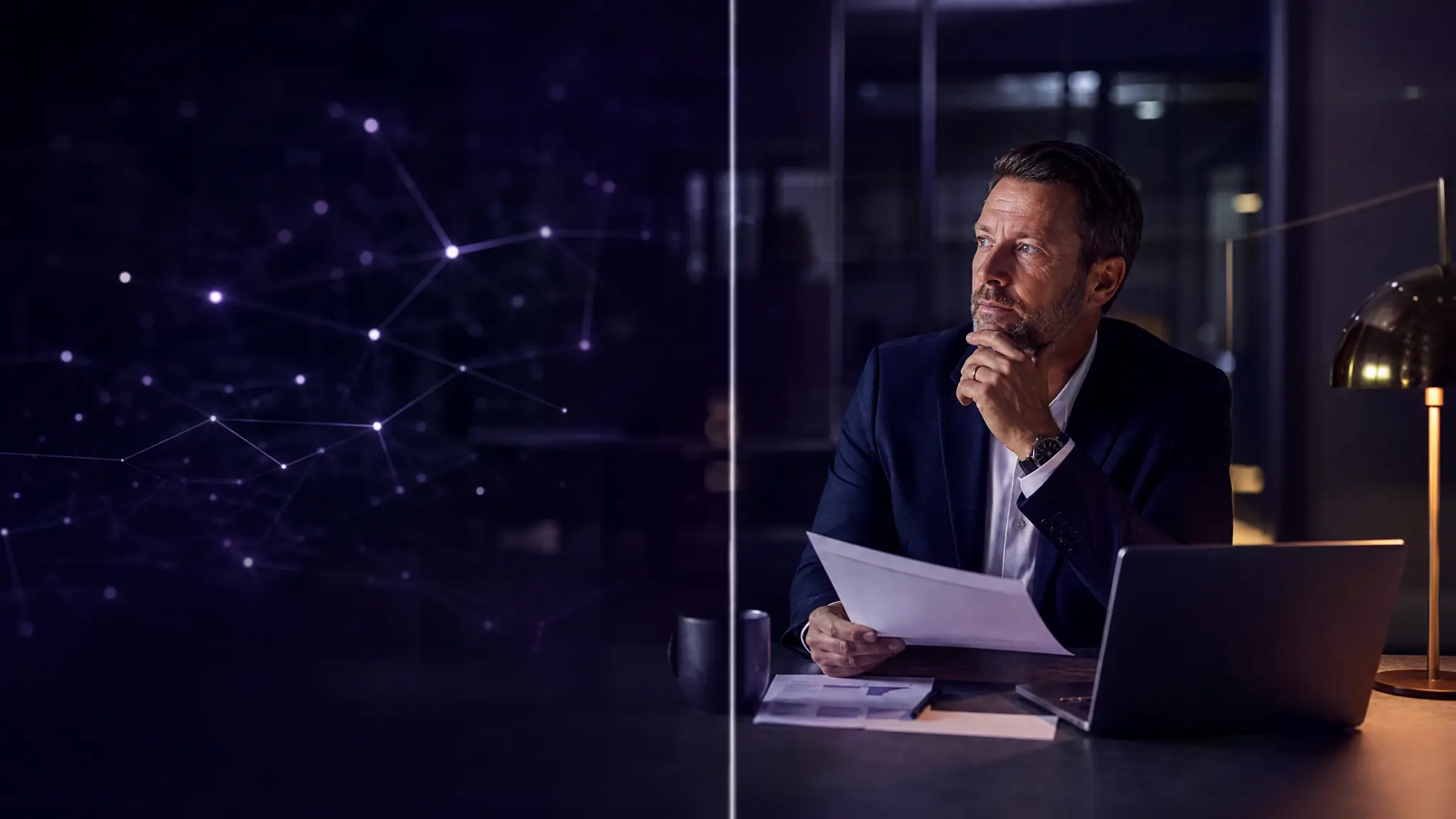 A business leader pauses with a document beside a laptop, facing a network of illuminated AI signals, representing human judgment at the boundary of AI action.